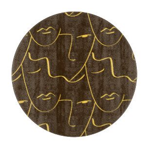 Planche À Découper Motif de faces de dessin d'une ligne