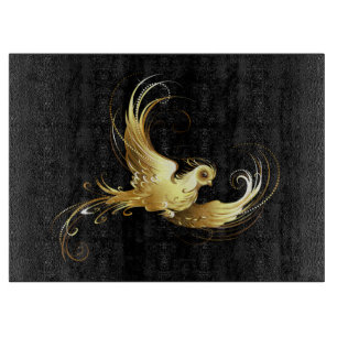Planche À Découper Oiseau doré sur fond noir
