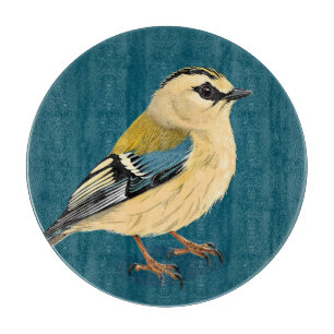 Planche À Découper Oiseau encadré par des fleurs vibrantes