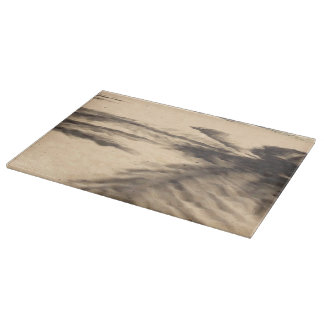 Planche À Découper Ombres sur le sable