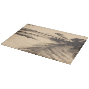 Planche À Découper Ombres sur le sable