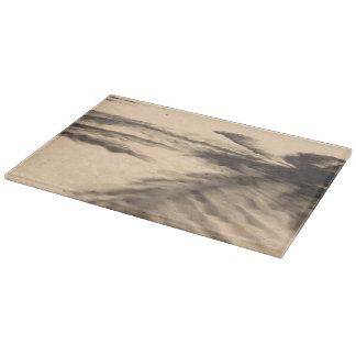 Planche À Découper Ombres sur le sable
