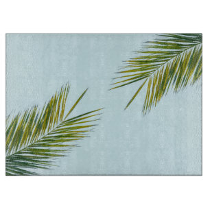 Planche À Découper Palmier Vert Tropical sur Fond Bleu Clair