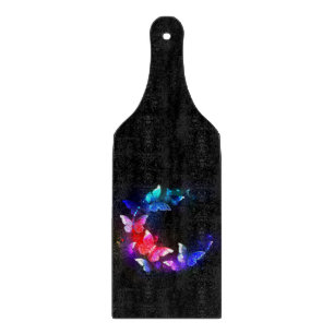 Planche À Découper Papillons de nuit Neon brillants sur arrière - pla