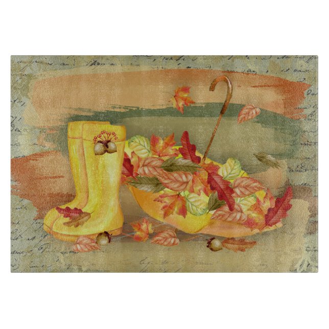 Planche À Découper Parapluie, bottes de pluie avec feuilles orange d' (Devant)