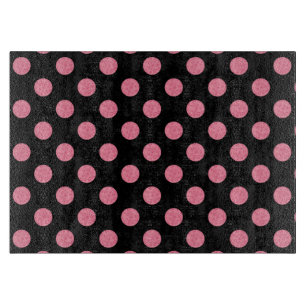 Planche À Découper pois roses tourbillonnant sur arrière - plan noir