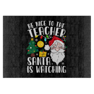 Planche À Découper Soyez gentil avec le professeur Santa regarde Prof