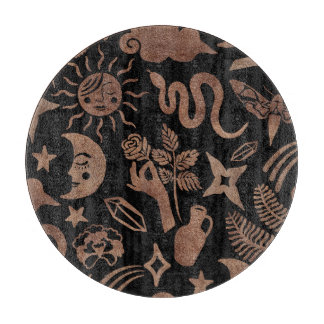 Planche À Découper Symboles mystiques : serpent, soleil, lune.