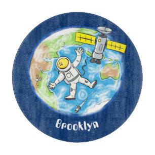 Planche À Découper Un astronaute amusant dans l'espace et la bande de