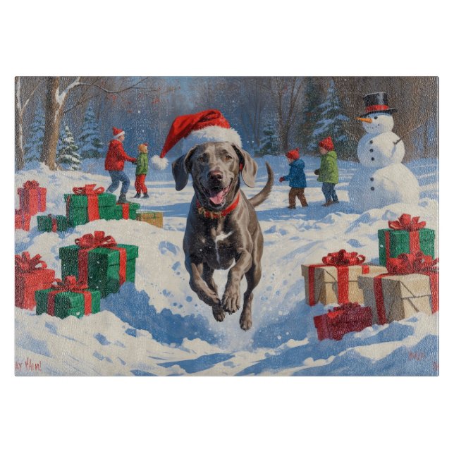 Planche À Découper Weimaraner courant dans la neige avec un chapeau d (Devant)