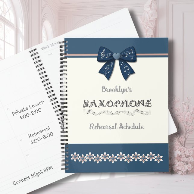 Planificateur musical à l'arc coquette bleu tendan (Trendy navy blue coquette bow saxophone planner for teen girls to track practice and concert dates.)