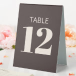 Plaque De Table Bold Basic Brown Modern Reception Table Number<br><div class="desc">This wedding table tent in brown features bold, modern typography on a rich neutral background for clear, at-a-glance table identification. The folded, self-standing format sits neatly on reception tables and works well for weddings, rehearsal dinners, and formal celebrations. A simple, polished choice that pairs easily with modern stationery, signage, and...</div>