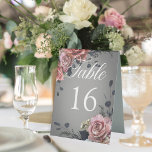 Plaque De Table Élégant rose blanc Rose gris Mariage<br><div class="desc">Offrez-vous une élégance intemporelle grâce à ce magnifique panneau de tentes de numéro de table mariage. Les coins fleuris réalistes, ornés de roses douces et blanches, de pivoines et de fleurs délicates, créent une atmosphère romantique et sophistiquée. L'arrière - plan gris moyen, mis en évidence par un flou transparent blanc...</div>