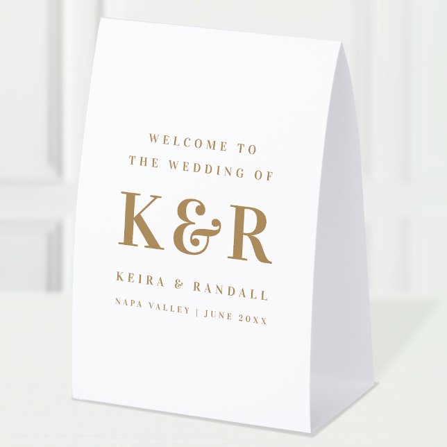 Plaque De Table Monogramme de mariage Bienvenue or et blanc (Elegant gold & white editable paper table tent Wedding welcome sign.)