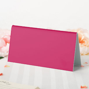 Plaque De Table un arrière - plan rose avec une bordure blanche