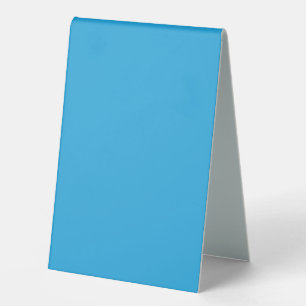 Plaque De Table un fond bleu avec un chat noir et blanc