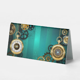 Plaque De Table Veille bijoux Steampunk sur un Arrière - plan vert