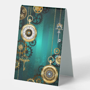 Plaque De Table Veille bijoux Steampunk sur un Arrière - plan vert