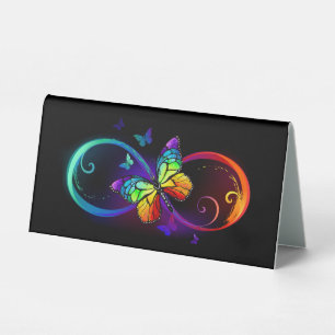 Plaque De Table Vibrant infinity with rainbow butterfly on black