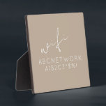 Plaque Photo Beige WiFi Password Sign Easel Stand<br><div class="desc">Keep your guests connected with this stylish and functional WiFi password sign plaque. The elegant beige design with a delicate script font makes it the perfect addition to any home or office decor. The 5.25x5.25 plaque comes with a convenient easel stand for easy display. Simply write your WiFi password on...</div>
