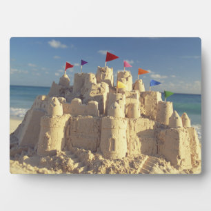 Plaque Photo Château de sable sur la plage