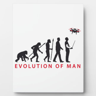 Plaque Photo évolution de l'homme contrôlant le drone
