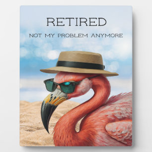 Plaque Photo Flamant rose à la retraite sur la plage avec Casqu