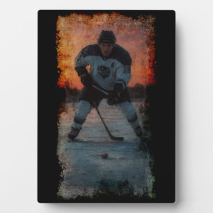Plaque Photo Joueur de hockey sur glace au coucher du soleil