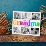 Plaque Photo Love You Grandma Colorful Bold 6 Photo Collage<br><div class="desc">"Je t'aime grand-mère." Elle aime chaque minute avec ses petits-enfants. Un visuel ludique, fantaisiste et élégant de la typographie audacieuse colorée à l'arc-en-ciel et de la typographie manuscrite noire recouvrent un coeur rose pâle et doux et un arrière - plan blanc. Ajoutez 6 photos chères de votre choix et customisez...</div>