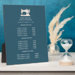 Plaque Photo Machine à coudre Or Seamstress prix Turquoise<br><div class="desc">La conception sous-estimée affiche vos services, votre liste de prix ou vos informations commerciales sous une illustration d'une machine à coudre vintage en faux or sur un arrière - plan turquoise et votre nom ou nom d'entreprise. Comprend trois en-têtes personnalisables et des champs de texte corps. Pour ajuster la disposition,...</div>