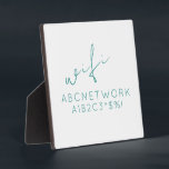 Plaque Photo Minimal Wifi Password Sign<br><div class="desc">Keep your guests connected with this stylish Minimal WiFi Password Sign Plaque. This plaque features a simple yet modern design with a elegant turquoise font on a simple clean white background. It is perfect for displaying your WiFi password in a way that is both functional and decorative. The 5.25x5.25 size...</div>