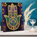 Plaque Photo  Ornate Gold Third Eye Hamsa<br><div class="desc">Whether worn as a piece of jewelry, displayed as an art piece, or used as a decorative element, the Hamsa with the third eye serves as a powerful reminder of the importance of spiritual growth, insight, and protection. It encourages individuals to open their minds and hearts to the unseen realms...</div>
