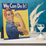 Plaque Photo Rosie le Riveter : Une femme forte pour l'autonomi<br><div class="desc">Rosie le Riveter, symbole de l'autonomisation des femmes, est apparu pendant la Seconde Guerre mondiale lorsque des millions de femmes sont entrées sur le marché du travail pour soutenir l'effort de guerre. Ces femmes, souvent appelées "Rosies", occupaient des emplois traditionnellement dominés par les hommes dans les usines et les chantiers...</div>