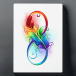 Plaque Photo Symbole d'infini avec plume arc-en-ciel<br><div class="desc">Symbole artistique à l'infini avec belle plume arc-en-ciel sur arrière - plan blanc. Style tatouage.</div>