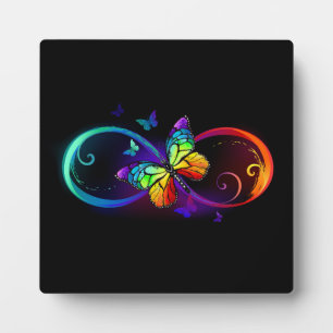 Plaque Photo Vibrant infinity with rainbow butterfly on black