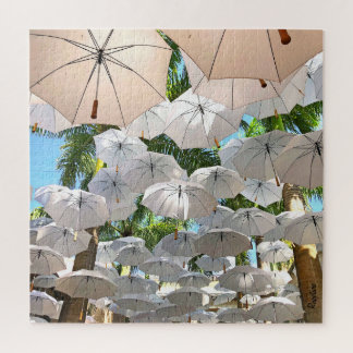 Pleuvant des parapluies puzzle de 676 morceaux