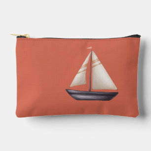Pochette À Accessoires Bateau à voile marron et nom sur fond rouge