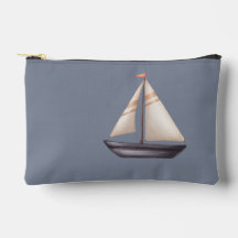 Bateau à voile marron et nom sur gris