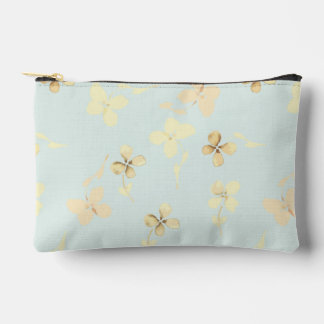 Pochette À Accessoires Bolsa de accesorios pequeña, con diseño floral.