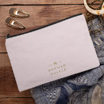 Pochette À Accessoires Monogramme Elegant Minimal Blush rose et or<br><div class="desc">A simple stylish custom monogram design in a gold minimalist typographiy on an elegant pastel blush pink background. The monogram initials and name can easily be personalized along with the feature line to make a design as unique as you are! Le parfait poison de l'accessoire pour un instant.</div>