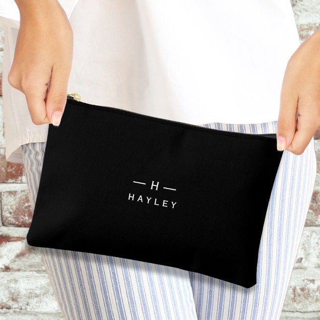 Pochette À Accessoires monogramme noir chic (Black and white monogram  accessory pouch being held by a woman's hands)