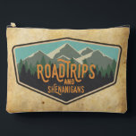 Pochette À Accessoires Road Trips & Shenanigans Outdoor Patch Zipper Bag<br><div class="desc">If you love road trips to National Parks, this zipper bag is for you! This fun road trip design features a National Parks inspired patch with a row of mountains and trees. The wording on this pouch reads "RoadTrips and Shenanigans" in orange. You can customize your bag with your name....</div>