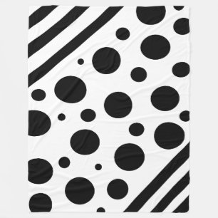 Pois noirs et blancs et couvertures à rayures