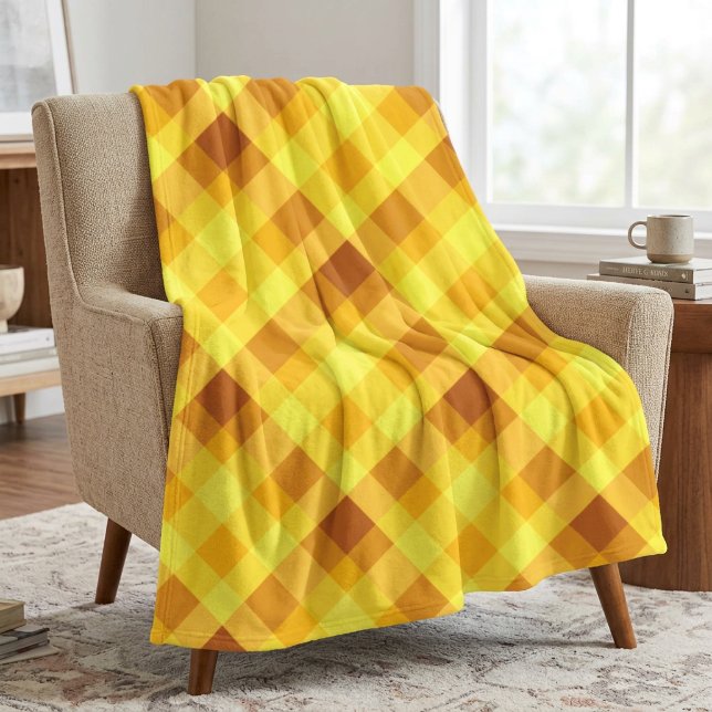 Polaire Couverture moyenne en molleton à carreaux jaune ja (Cute Egg Yolk Yellow Plaid Medium Fleece Blanket draped over a chair in a living room.)