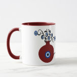 pomegranate with evil eye mug<br><div class="desc">Pomegranate in many cultures symbolizes abundance, blessing, fertility, and immortality. And the evil eye to ward of the negativity when you begin your day with a coffee in this unique mug.</div>