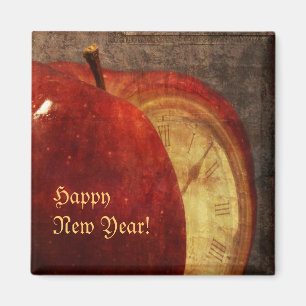 pomme et aimant de bonne année d'horloge