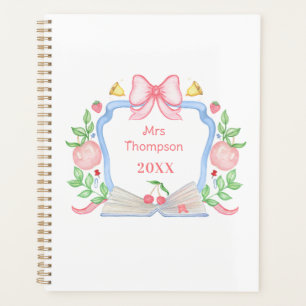 Pommes et livre Crest de l'école   Professeur