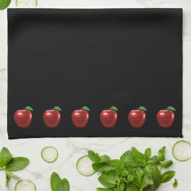 Pommes rouges élégantes sur serviette de cuisine n (Plié)