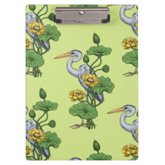 Porte-bloc Héron dans le jardin de lotus jaune sur rosée de m