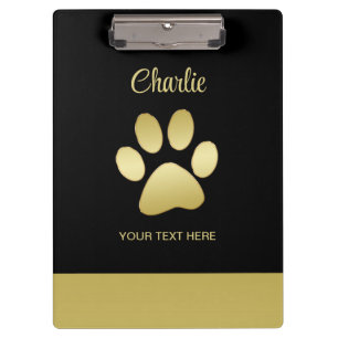 Porte-bloc Paw chien brillant or sur arrière - plan noir